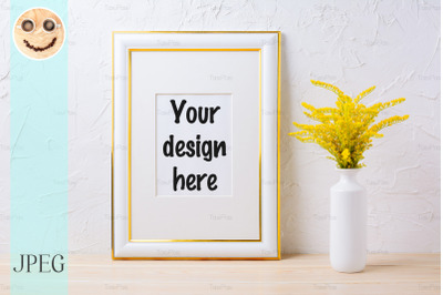 Gold decorated frame mockup with ornamental yellow flowering grass in