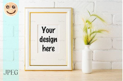 Gold decorated frame mockup with yellow green wild grass ears