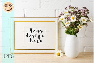 Gold decorated landscape frame mockup with wildflowers