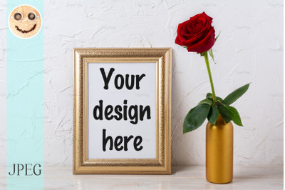 Gold frame mockup with dark red rose in vase