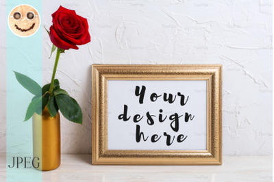 Landscape gold frame mockup with red rose in vase