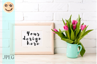 Wooden landscape frame mockup with pink tulips in jug