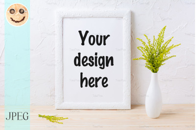 White frame mockup with ornamental grass in exquisite vase