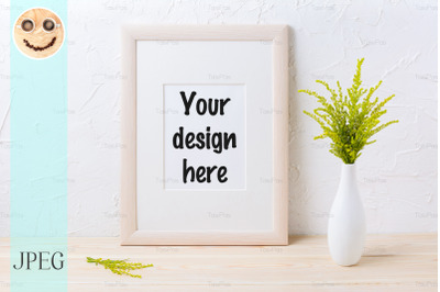 Wooden frame mockup with ornamental grass in exquisite vase
