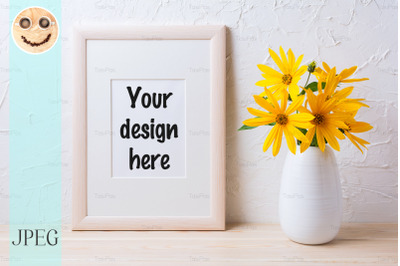 Wooden white frame mockup with yellow rosinweed flowers