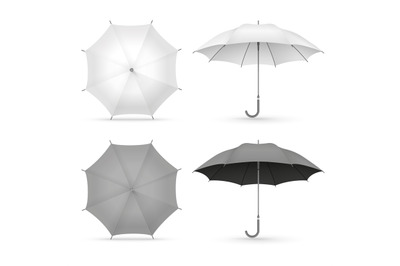 White and black realistic umbrellas isolated on white background