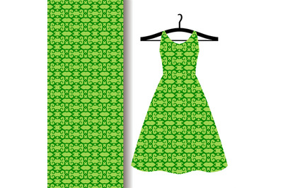 Dress fabric with green arabic pattern