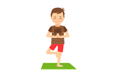 Young boy standing in yoga pose