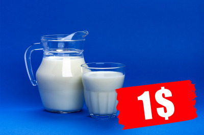 Jar and glass of milk isolated on blue background with copy space