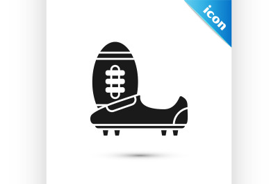 Black Soccer or football shoes with spikes icon isolated on white back