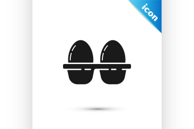 Black Chicken egg in box icon isolated on white background.  Vector Il