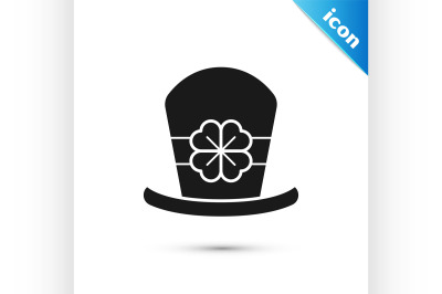 Black Leprechaun hat and four leaf clover icon isolated on white backg