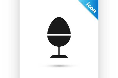 Black Chicken egg on a stand icon isolated on white background.  Vecto