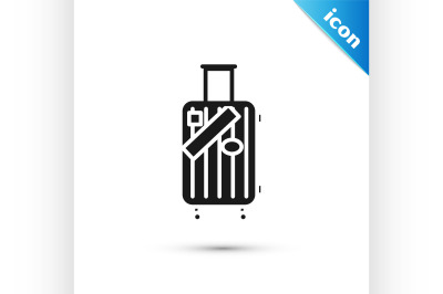 Black Suitcase for travel and stickers icon isolated on white backgrou