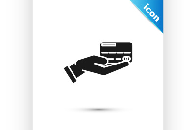 Black Human hand holding with credit card icon isolated on white backg