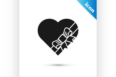 Black Candy in heart shaped box and bow icon isolated on white backgro