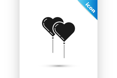 Black Balloons in form of heart with ribbon icon isolated on white bac