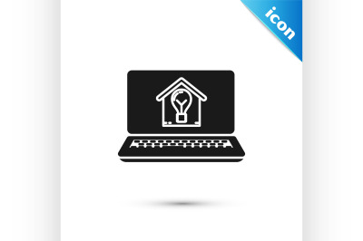 Black Laptop with smart house and light bulb icon isolated on white ba