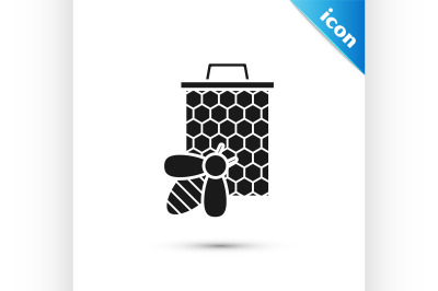 Black Bee and honeycomb icon isolated on white background. Honey cells