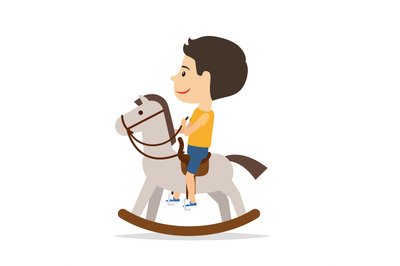 Little boy sitting on horse toy