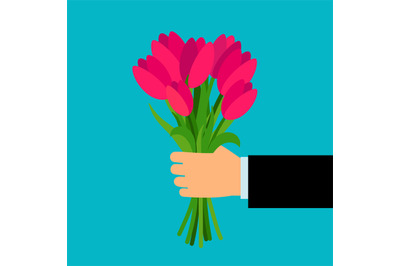 Hand holding pink tulip flowers bouquet