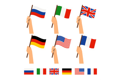 Hands holding flags of different countries