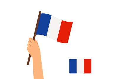 Hand holding flag of France