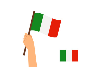 Human hand holding flag of Italy