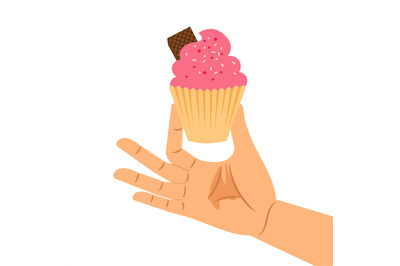 Hand holding pastry pink cupcake