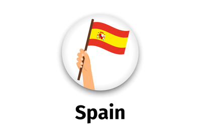 Spain flag in hand&2C; round icon