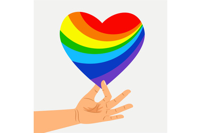 Human hand hold rainbow heart. LGBT concept