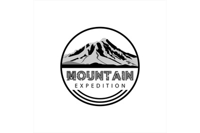 Illustration of mountain logo design with silhouette view of mountain