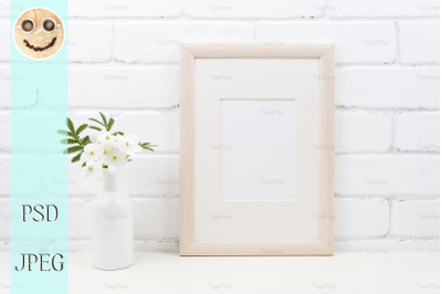 Wooden frame mockup with Tobacco flowers.