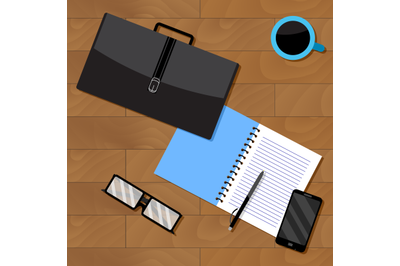 Top view of business, notebook and briefcase with documents