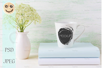 Coffee mug mockup light green latte shape.