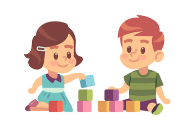 Boy and girl play cubes. Friendly children building from blocks on flo