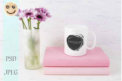 Coffee mug mockup with lilac daisy