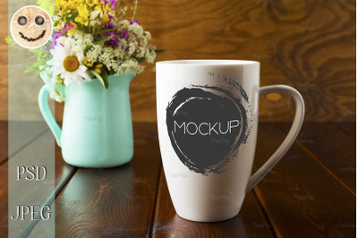 Coffee mug mockup with mint green flowerpot