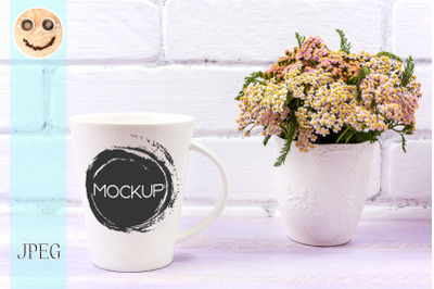 White coffee latte mug mockup with pink yarrow