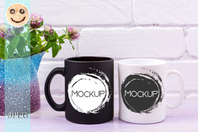 White and black mug mockup with pink clover