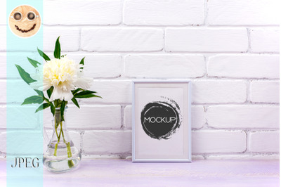 White small frame mockup with peony in glass pitcher