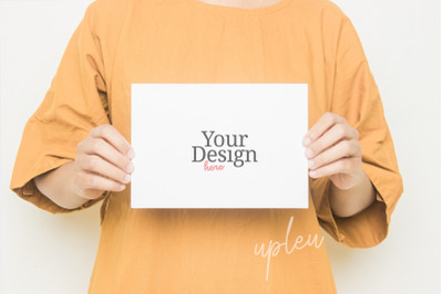 A5 Greeting Card Mockup&2C; Model Handling A5 Card Mockup With Dress