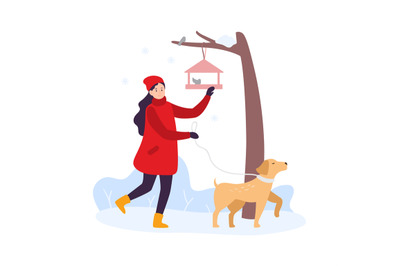 Winter activities. Girl walking with dog and feeding birds. Woman char