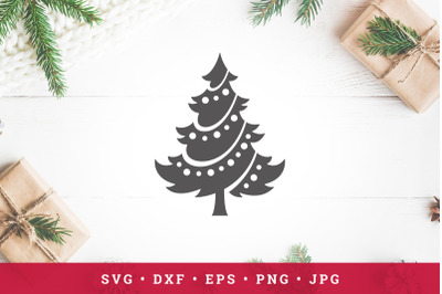 Decorated Christmas tree silhouette. Vector illustration. Cut file cli