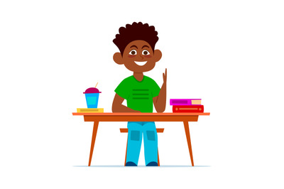 Multiethnic boy at school desk in classroom, smiling child sitting on