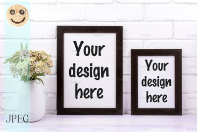 Two black poster frames mockup with pink yarrow