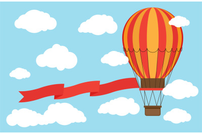 Classic hot air balloon with red ribbon flying from sky and clouds