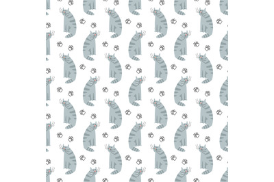 Cute cartoon cat and footprints seamless pattern