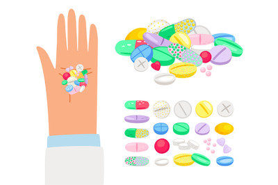 Colored pills and tablet in human hand