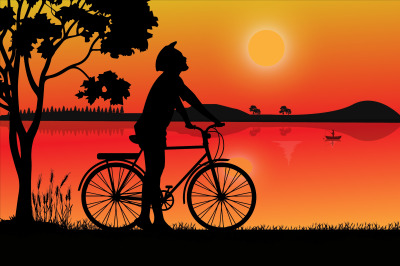 cyclist with sunrise silhouette